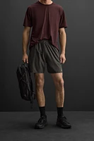 TEXTURED RUNNING SHORTS