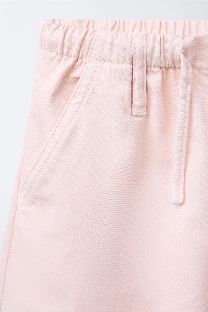 PANTALON FLUIDE À JAMBES LARGES