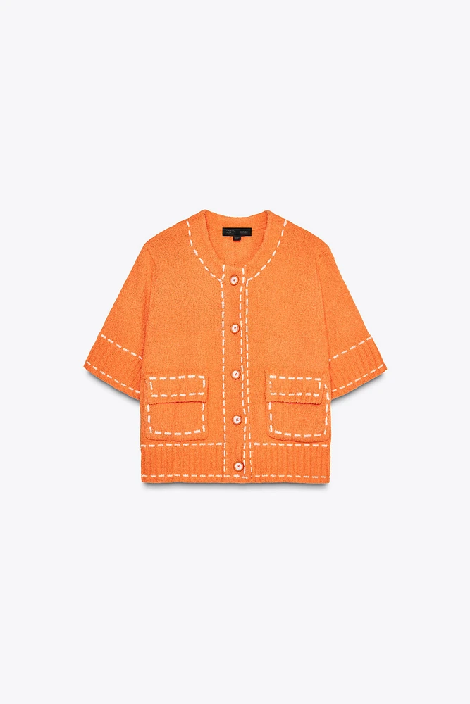 VESTE EN MAILLE SURPIQÛRES