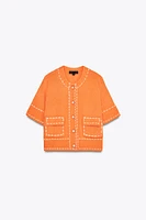 VESTE EN MAILLE SURPIQÛRES