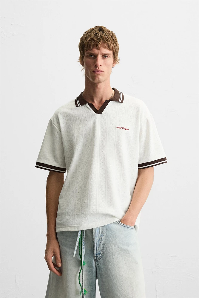 POLO JACQUARD INSCRIPTION BRODÉE