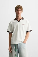 POLO JACQUARD INSCRIPTION BRODÉE