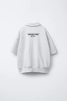 SWEAT POLO À INSCRIPTION
