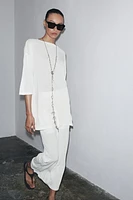 TOP OVERSIZE EN MAILLE