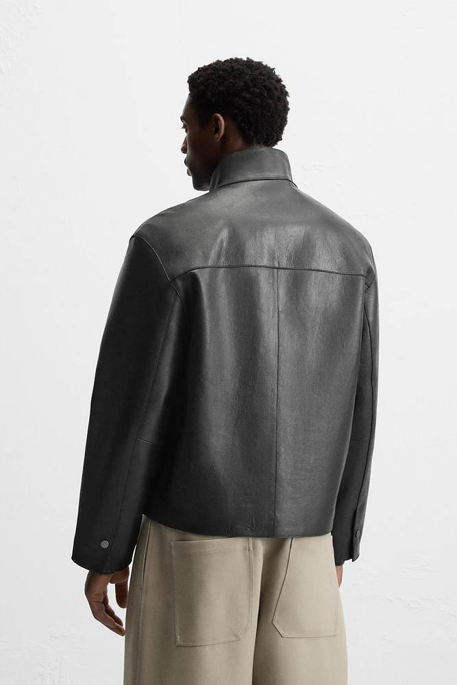 BLOUSON EN CUIR À POCHES