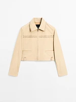 Short leather jacket with stud details