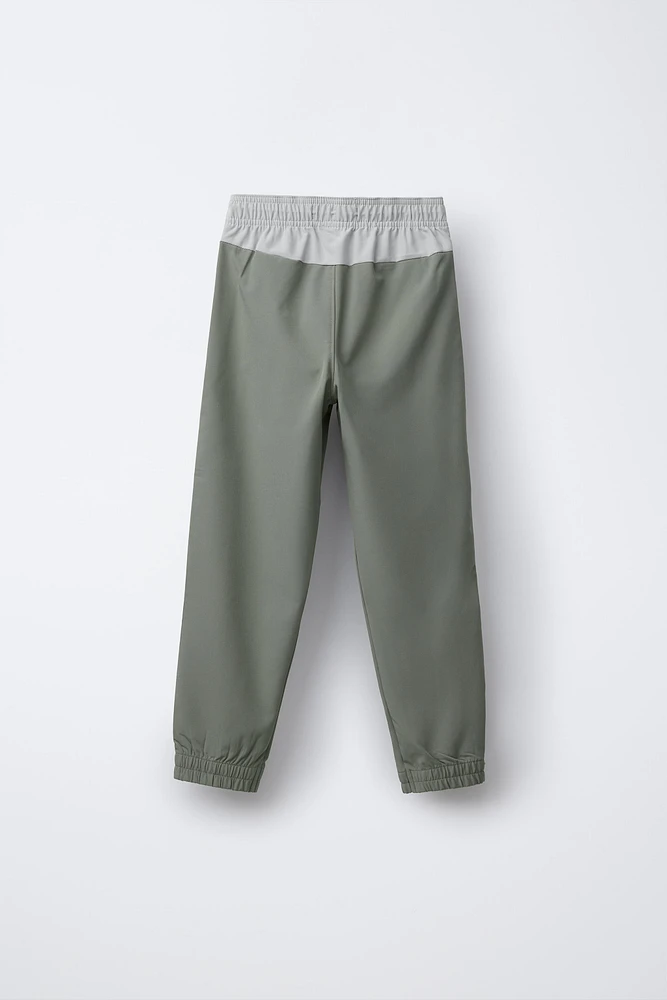 TECHNICAL JOGGER PANTS WITH SIDE STRIPE