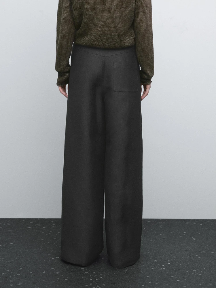 Flowing wide-leg trousers with seam details