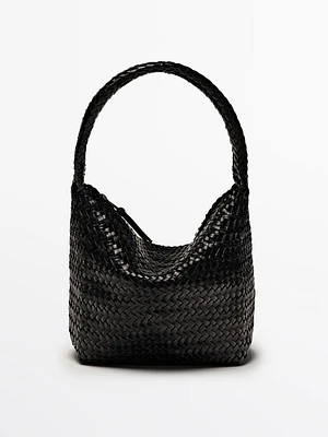 Sac seau tressé en cuir nappa