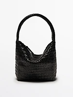 Sac seau tressé en cuir nappa
