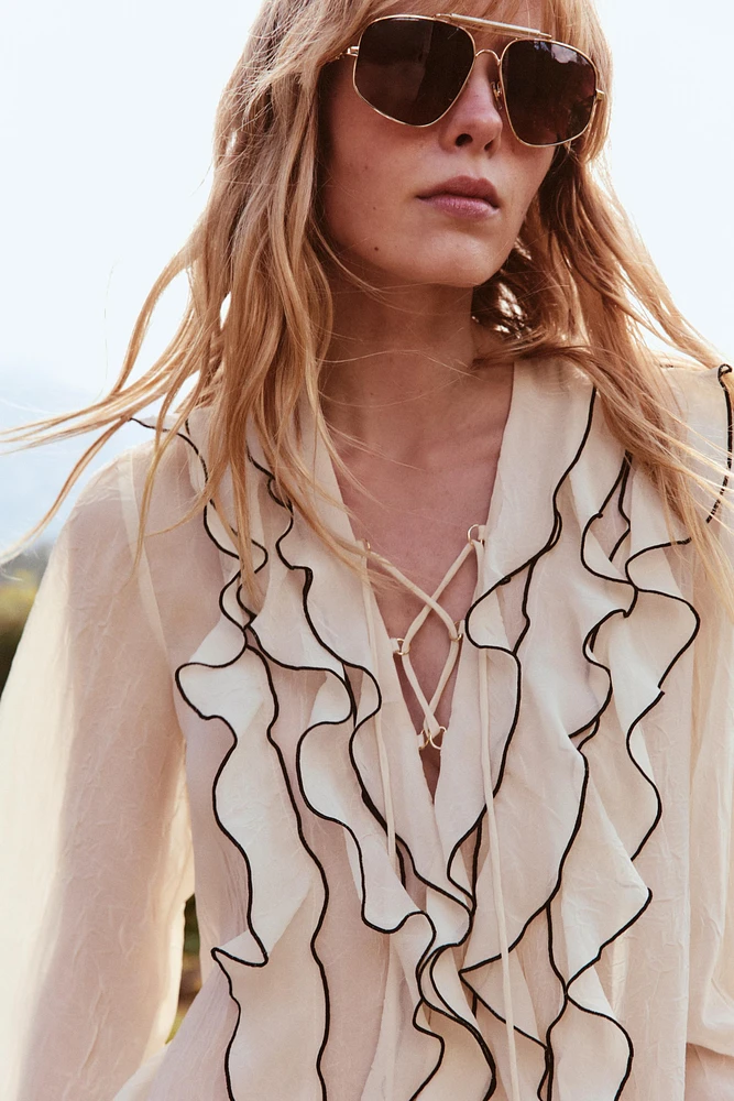 SEMI-SHEER BLOUSE WITH RUFFLES