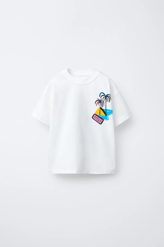 T-SHIRT IMPRIMÉ PALMIERS