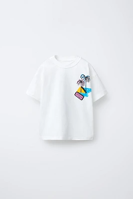 T-SHIRT IMPRIMÉ PALMIERS