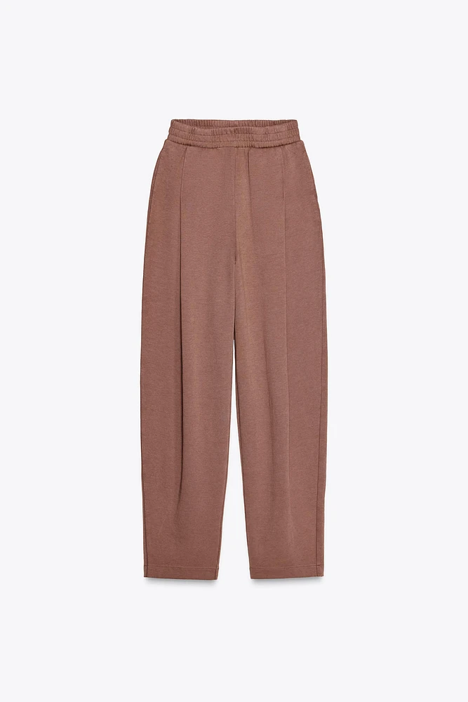 WASHED PLEATED PANTS