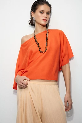 TOP CAPE EN MAILLE UNIE
