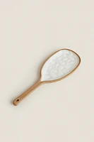 SPOON WITH RAISED DESIGN