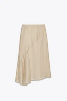 JUPE FLUIDE SEMI-TRANSPARENTE
