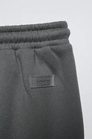 SEAMED PANTS WITH LABEL DETAIL