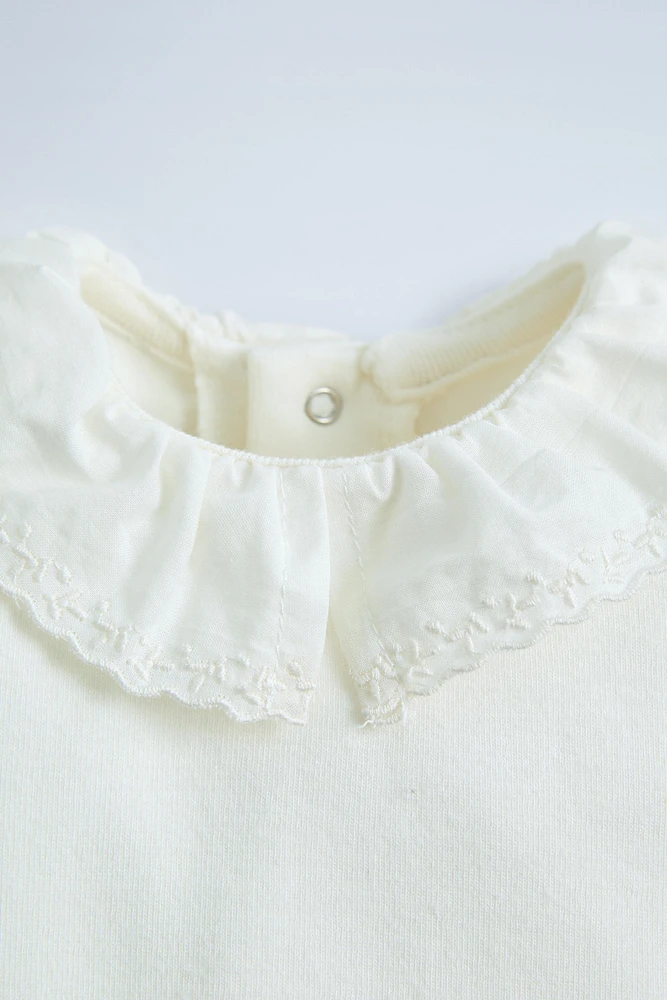 COMBINATION PLUSH BODYSUIT WITH PETER PAN COLLAR