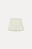 PEARL KNIT MINI SKIRT