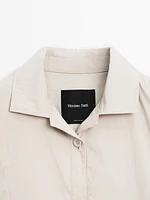 Bomber jacket with seams and gathering