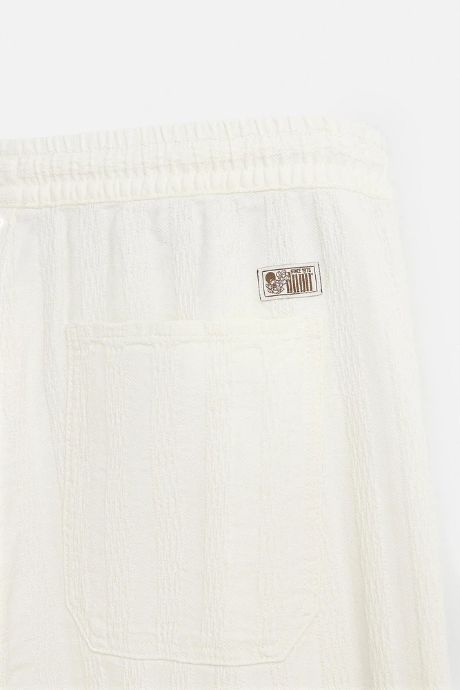 PANTALON JACQUARD RAYÉ