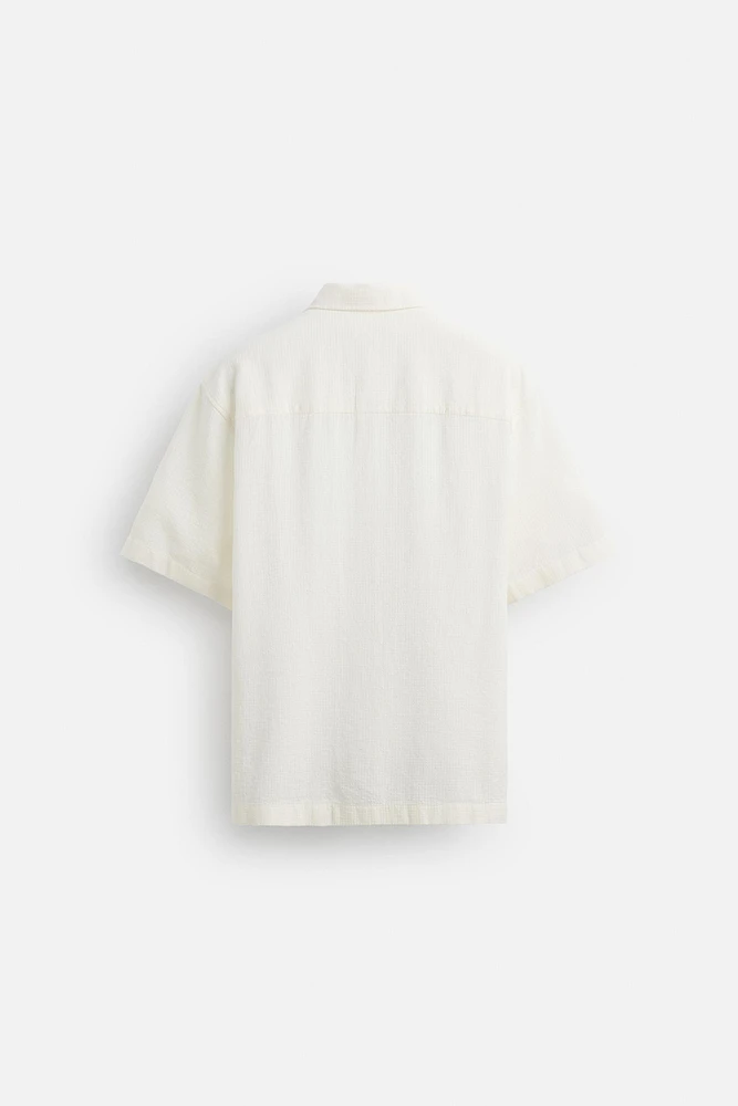 CHEMISE POLO JACQUARD À CARREAUX