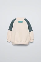 SWEATSHIRT WITH PADDED SHOULDERS