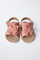 SANDALES EN CUIR PAPILLON