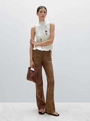 Pantalon flare en cuir finition daim