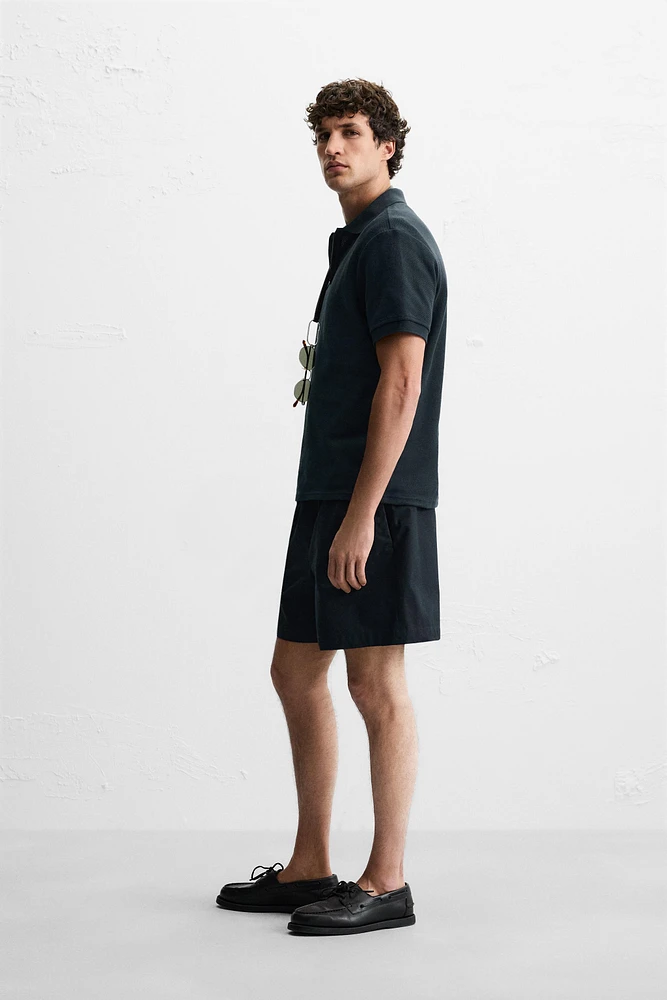 QUARTER ZIP POLO