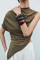 TOP ASYMÉTRIQUE