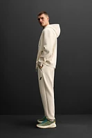 TECHNICAL ZIPPER JOGGER PANTS