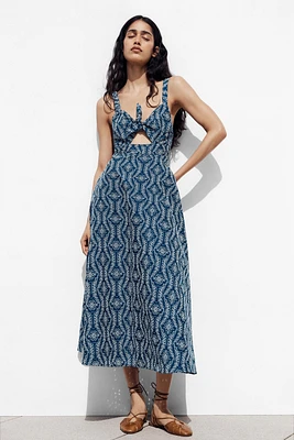 ROBE MIDI BRODERIES AJOURÉES EFFET GOMME