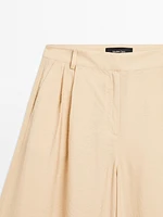 Pantalon palazzo à pinces