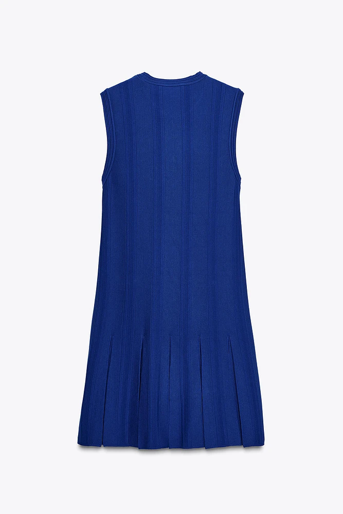 ROBE EN MAILLE À PLIS PLATS
