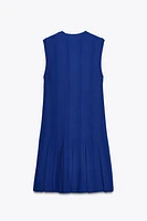 ROBE EN MAILLE À PLIS PLATS