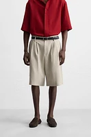 PLEATED WIDE FIT BERMUDA SHORTS