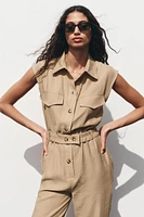 SLEEVELESS BELTED JUMPSUIT