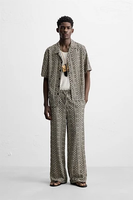 PERFORATED JACQUARD RELAXED FIT PANTS