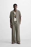 PERFORATED JACQUARD RELAXED FIT PANTS