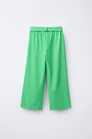 TEXTURED BELTED PANTS