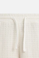 TEXTURED JOGGER SHORTS