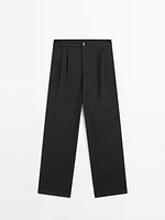 Flowing wide-leg cotton blend trousers with pleats