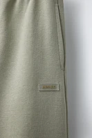 PANTALON DROIT AVEC ÉTIQUETTE AUTOCOLLANTE