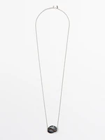 Necklace with ceramic pendant