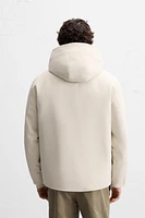 BLOUSON TECHNIQUE À CAPUCHE