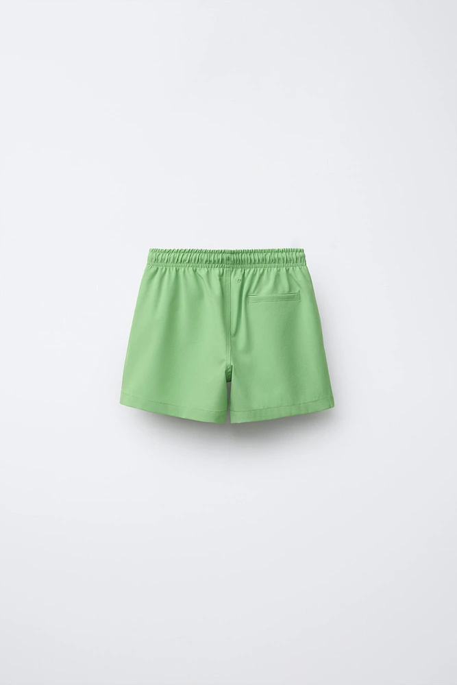 6-14 ANS/ SHORT DE BAIN STANDARD INSCRIPTION