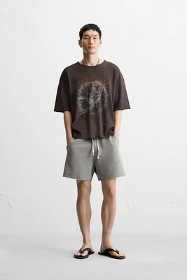 BERMUDA RELAXED FIT DÉLAVÉ