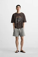 BERMUDA RELAXED FIT DÉLAVÉ